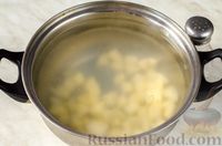 Фото приготовления рецепта: Суп с тушенкой, пшеном и яйцами - шаг №5