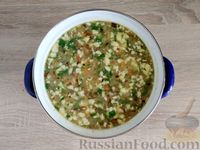 Фото приготовления рецепта: Суп с кукурузной крупой и варёными яйцами - шаг №12