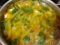 Фото приготовления рецепта: Суп с куриными фрикадельками и кабачковой "лапшой" - шаг №14