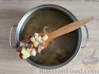 Фото приготовления рецепта: Суп с куриными сердечками и гречкой - шаг №9