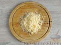 Фото приготовления рецепта: Пельмени, запечённые в сметанно-томатном соусе - шаг №7