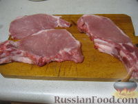 Фото приготовления рецепта: Отбивная из свинины на косточке - шаг №2