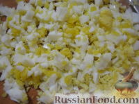 Фото приготовления рецепта: Начинки для пирожков из риса с яйцом - шаг №4