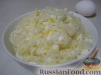 Фото приготовления рецепта: Начинки для пирожков из риса с яйцом - шаг №6