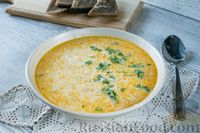 Фото к рецепту: Сливочный суп с колбасками, тыквой и рисом