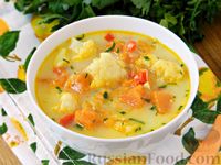 Фото приготовления рецепта: Тыквенный суп с курицей, цветной капустой и сливочным сыром - шаг №14