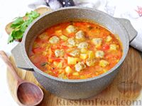 Фото к рецепту: Томатный суп с овощами и фрикадельками