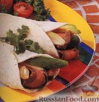 Фото к рецепту: Закусочные рулеты с мясом и овощами