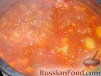 Фото приготовления рецепта: Томатный суп с рисом - шаг №11