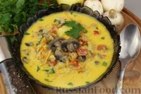 Фото к рецепту: Сырный суп с фаршем, капустой и грибами