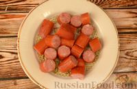 Фото приготовления рецепта: Суп из квашеной капусты со свининой, курицей и копчёными колбасками - шаг №3