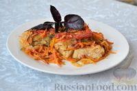 Фото к рецепту: Рыба, запеченная в духовке с овощами, под соусом