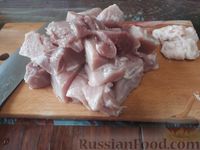 Фото приготовления рецепта: Свинина, запечённая с квашеной капустой и сладким перцем - шаг №2