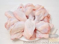 Фото приготовления рецепта: Хрустящие куриные крылышки в лимонном маринаде (в духовке) - шаг №2