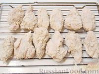 Фото приготовления рецепта: Хрустящие куриные крылышки в лимонном маринаде (в духовке) - шаг №7