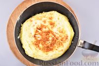 Фото приготовления рецепта: Омлет с сыром в лаваше (на сковороде) - шаг №11