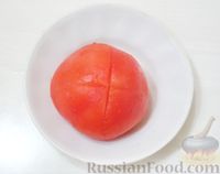 Фото приготовления рецепта: Рыба, запеченная под соусом из сметаны, помидоров и сыра - шаг №7