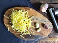 Фото приготовления рецепта: Овощное рагу из картошки, капусты и кабачков - шаг №4