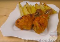 Фото к рецепту: Запечённые куриные голени  в сметанно-чесночном маринаде