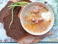 Фото к рецепту: Картофельный суп с перловкой и копчёными рёбрышками