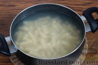 Фото приготовления рецепта: Макароны с фасолью, рисом и маринованными грибами в томатном соусе - шаг №10