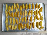 Фото приготовления рецепта: Картошка по-деревенски в духовке - шаг №9