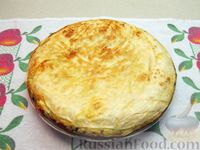 Фото приготовления рецепта: Пирог из лаваша с картофелем, творогом и сыром (на сковороде) - шаг №20