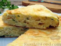 Фото приготовления рецепта: Пирог из лаваша с картофелем, творогом и сыром (на сковороде) - шаг №22