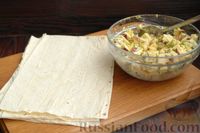Фото приготовления рецепта: Рулетики из лаваша с копчёным сыром и варёными яйцами - шаг №6