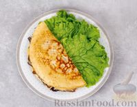 Фото приготовления рецепта: Омлет с начинкой из вешенок и сыра - шаг №9