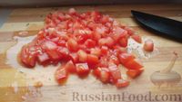 Фото приготовления рецепта: Отбивные из говядины, запечённые с сыром и помидором - шаг №8