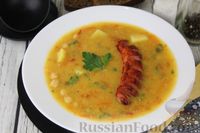 Фото к рецепту: Густой нутовый суп с запечёнными сосисками