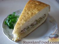 Фото к рецепту: Пирог из сырой рыбы с луком и рисом