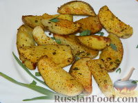 Фото к рецепту: Румяные картофельные дольки на гарнир