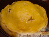 Фото приготовления рецепта: Влажный шоколадный пирог на кефире, с изюмом - шаг №10