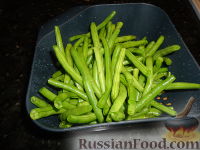 Фото приготовления рецепта: Тилапия с зеленой фасолью и рисом - шаг №1