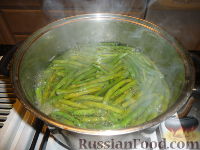 Фото приготовления рецепта: Тилапия с зеленой фасолью и рисом - шаг №2