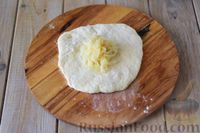 Фото приготовления рецепта: Дрожжевые пирожки с капустой, тушенной в молоке - шаг №19
