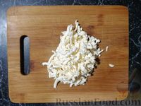 Фото приготовления рецепта: Куриные сердечки, тушенные в сырном соусе - шаг №7