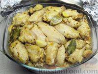Фото приготовления рецепта: Куриные крылышки, запечённые с рисом - шаг №16
