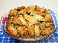 Фото приготовления рецепта: Куриные крылышки, запечённые с рисом - шаг №17