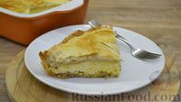 Фото к рецепту: Слоёный пирог с луком и сыром в яичной заливке