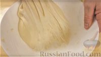 Фото приготовления рецепта: Булочки-кармашки с копчёностями, овощами и сыром - шаг №11