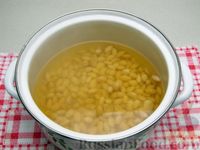 Фото приготовления рецепта: Фасолевый суп со свиными рёбрами и шампиньонами - шаг №3