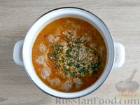 Фото приготовления рецепта: Суп с фрикадельками, рисом и грецкими орехами - шаг №16