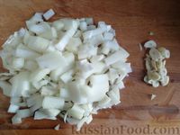 Фото приготовления рецепта: Куриные фрикадельки, запечённые в луковом соусе - шаг №7