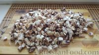 Фото приготовления рецепта: Котлеты из риса и шампиньонов под морковно-грибным соусом (в духовке) - шаг №7
