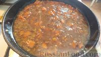 Фото приготовления рецепта: Котлеты из риса и шампиньонов под морковно-грибным соусом (в духовке) - шаг №20