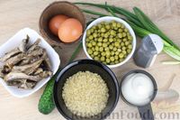 Фото приготовления рецепта: Шпротный салат с рисом, огурцом, горошком и яйцами - шаг №1