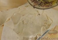 Фото приготовления рецепта: Пирог из лаваша, с консервированной рыбой и картофелем - шаг №12